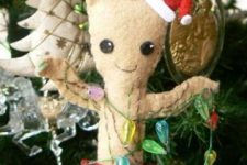 a baby Groot Christmas ornament of various felt, with colorful beads is a fun and lovely idea to rock