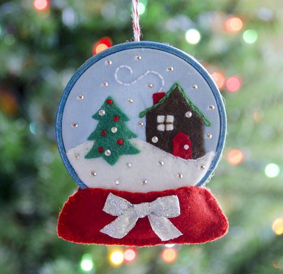 a colorful snow globe Christmas ornament with embroidery and beads is a very chic and beautiful idea to rock