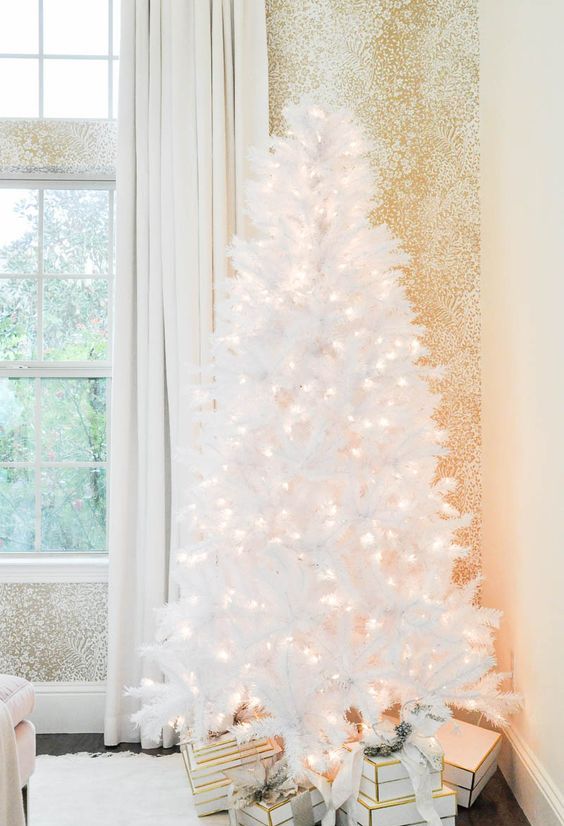 A pure white Christmas tree with LEDs looks very magical and will create a snowy fairy tale in your home