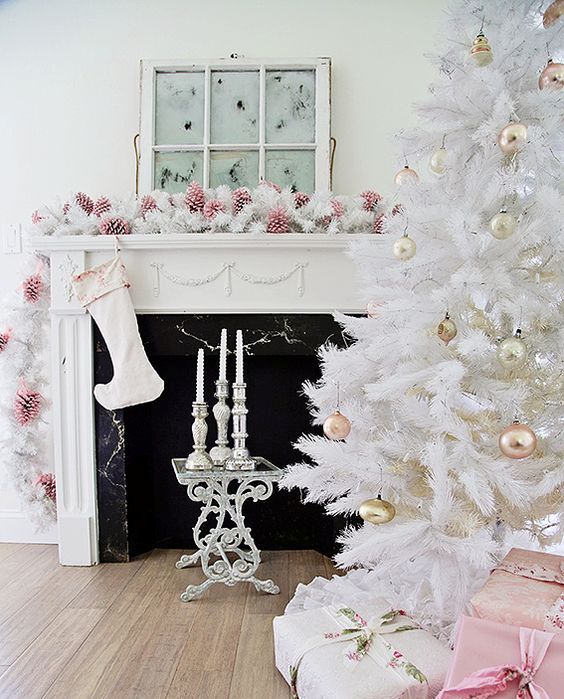 All white Christmas tree with pastel metallic ornaments looks chic and refined
