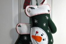 green and white felt Christmas mittens with colorful embroidery and beads are cool not only for tree decor but also for front doors