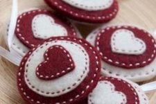 red and white Christmas felt ornaments with hearts are lovely and bright and will bring in some color to the tree