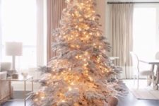 rock a snowy Christmas tree with only lights for an incredible holiday look