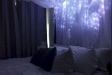 a canopy of airy white fabric and lights all over the bed is a very romantic option
