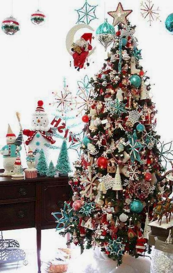a retro Christmas tree decorated with blue, red and white ornaments so densely that the tree isn't seen at all