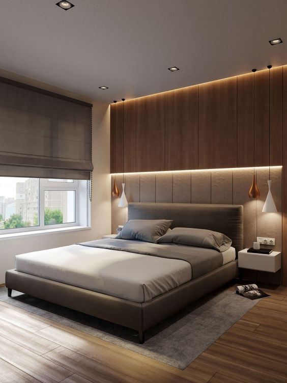 Integrated lights over the headboard make the bedroom look ultra modern