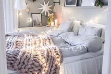 lights over the bed and around plus a dreamy paper lantern