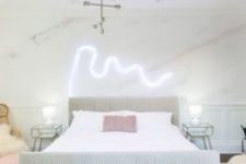 neon lighting over the bed is a cool and modern idea to light up the space