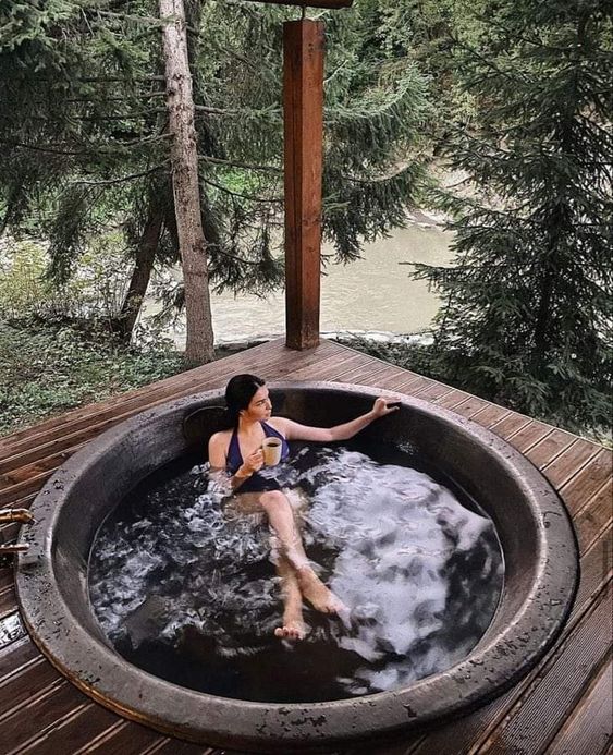 a built-in jacuzzi in a wooden deck, with a gorgeous sea and river view is a perfect spot for a weekend