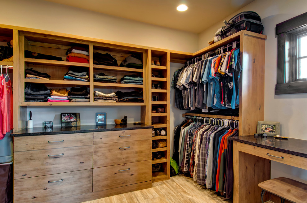 Solid wood cabinetry is a classic way to go for walk-in closets.