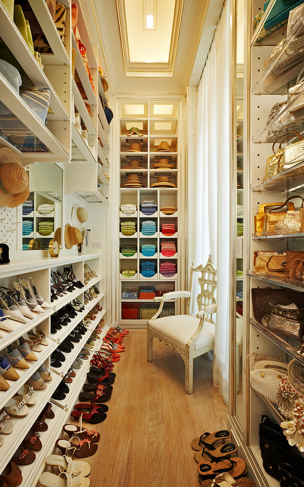 Organizing a walk-in wardrobe by object and color would make it looks like a work of art.