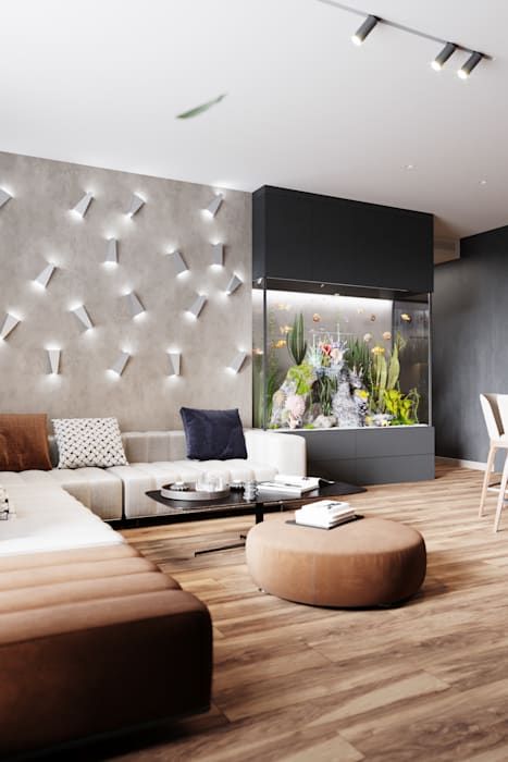 a contemporary living room finished with a large aquarium with lights and sleek panels is a very chic space