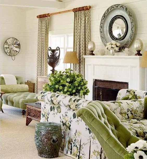 an elegant vintage living room in neutrals, with green and floral touches, green and neutral blooms