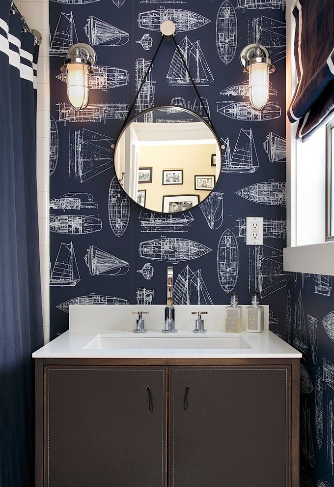 A creative wallpaper could work miracles even for masculine bathrooms.