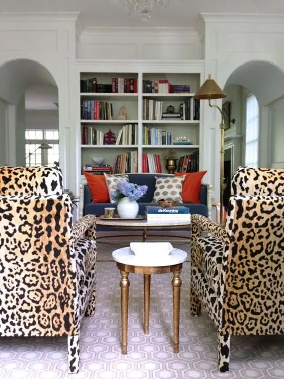 a couple of leopard print chairs here makes the space bold and livley and refresh it a lot, this is a very unusual and bold idea