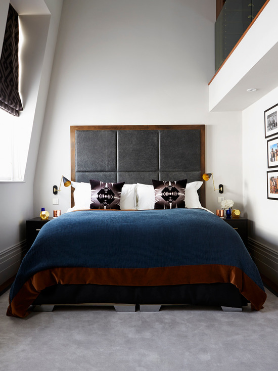 a large upholstered headboard could easily set a tone in a compact bedroom