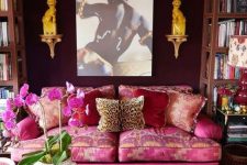 a maximalist living room with a black wall