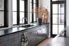 grey furniture with black countertops and gold handles for a timelessly elegant vintage look