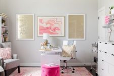 a cool home office with lots of pinks