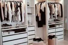 a small and glam closet with open storage units, drawers, mirrors and a pink pouf is a lovely idea for a modern home