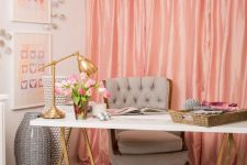 a stylish feminine home office with pink curtains, a trestle desk and refned chairs and stols plus gold touches
