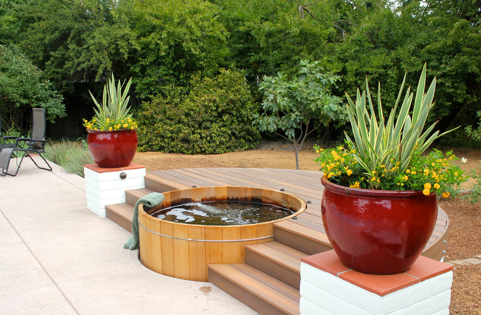 Large planters by the tub is a great way to decorate the surrounding area. (Michael Glassman & Associates)