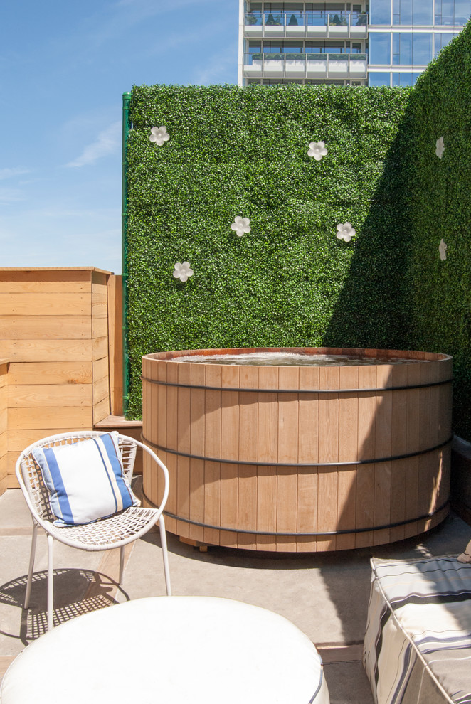 a living wall is a great privacy screen for an outdoor hottub