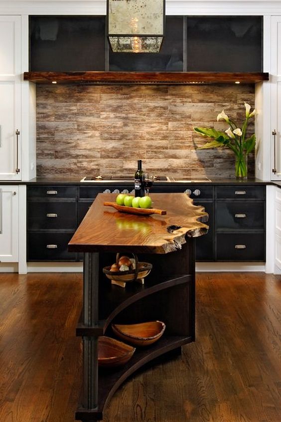 a small and narrow kitchen island in dark stained wood with a living edge countertop looks really wow