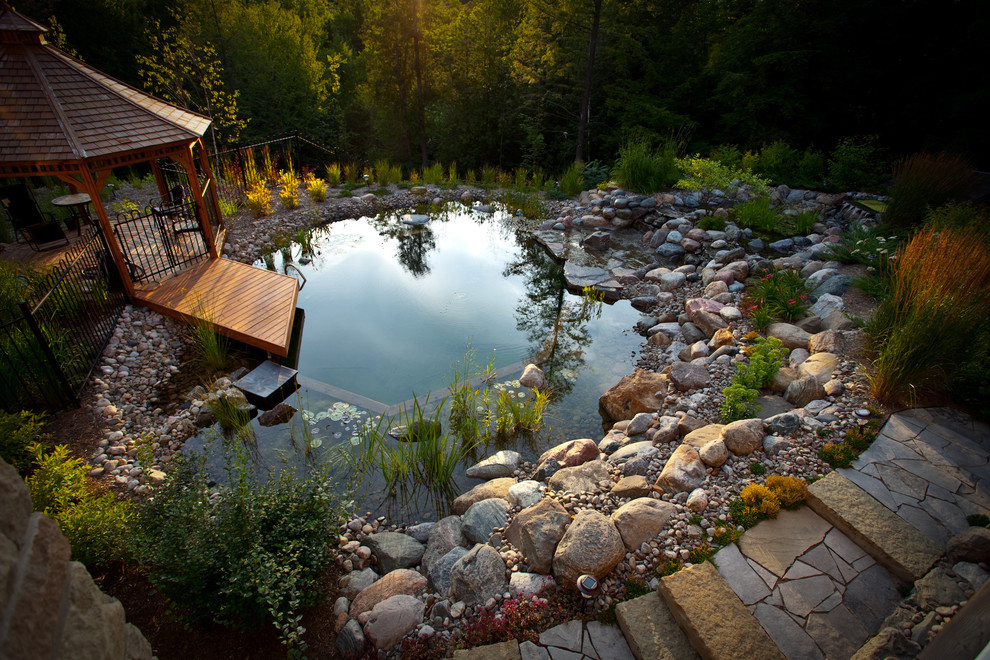 stone pavers could surround any swimming pond so you could walk by it