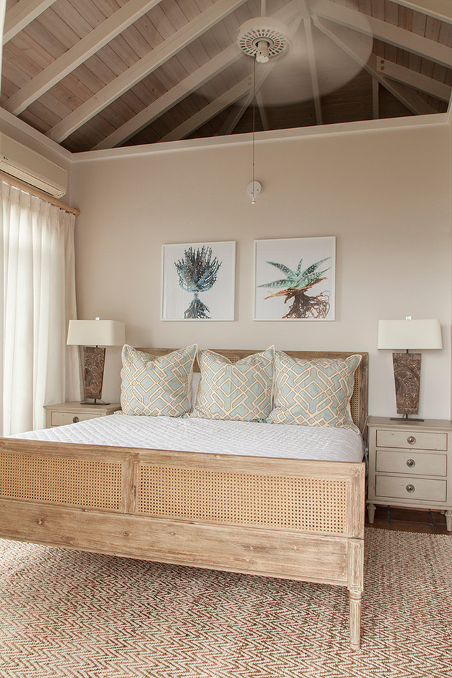 an all-neutral tropical bedroom done with textures - wicker, cane, wood, jute and a couple of tropical artworks  (Mimi &amp; Hill interiors)