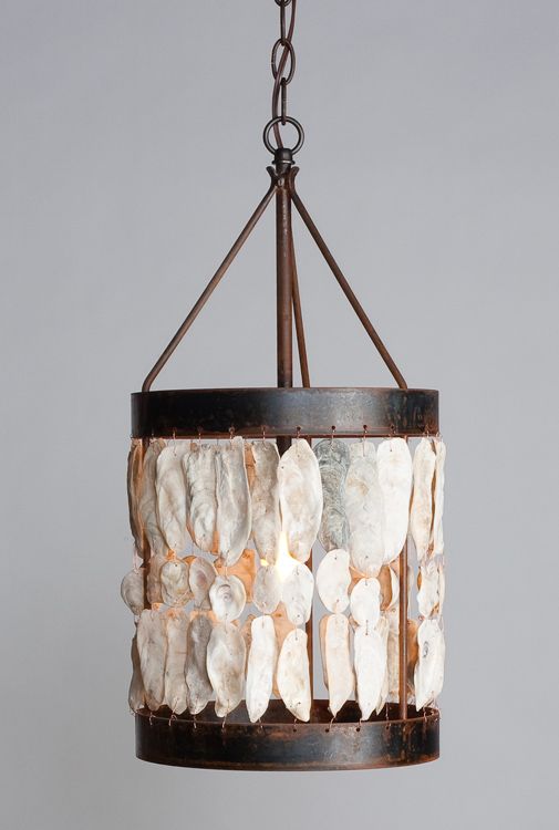 a shell drum light is a gorgeous pendant light idea for a coastal or nautical space