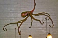 an octopus chandelier is a bold and statement-like idea for any seaside-inspired space and will catch all the eyes