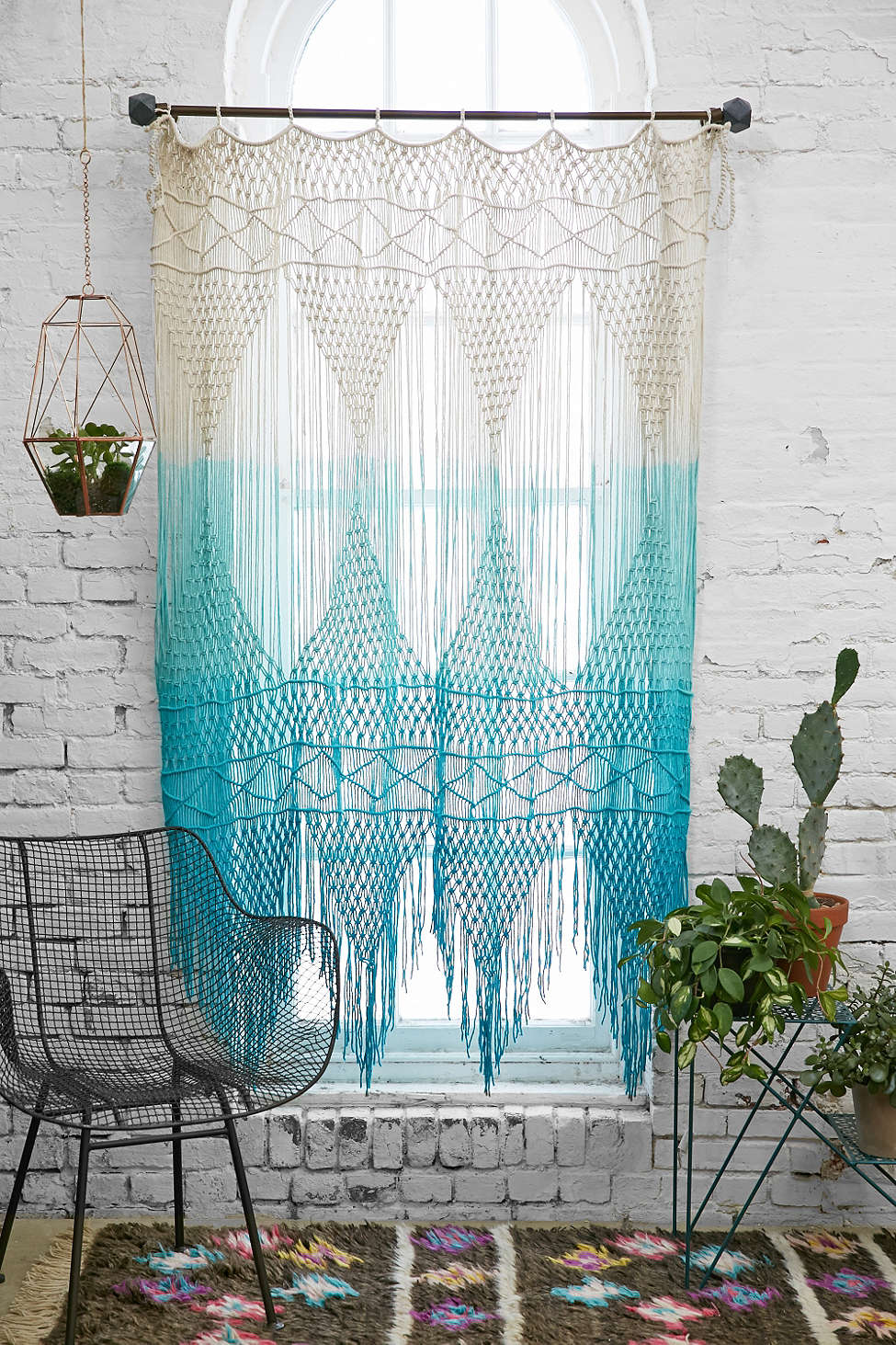 Macrame curtains would be a perfect addition to bohemian bedroom decor.