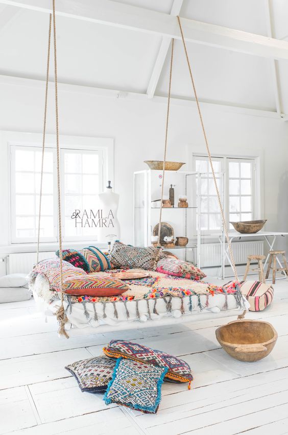 For an attic boho bedroom a hanging bed would be an awesome choice.