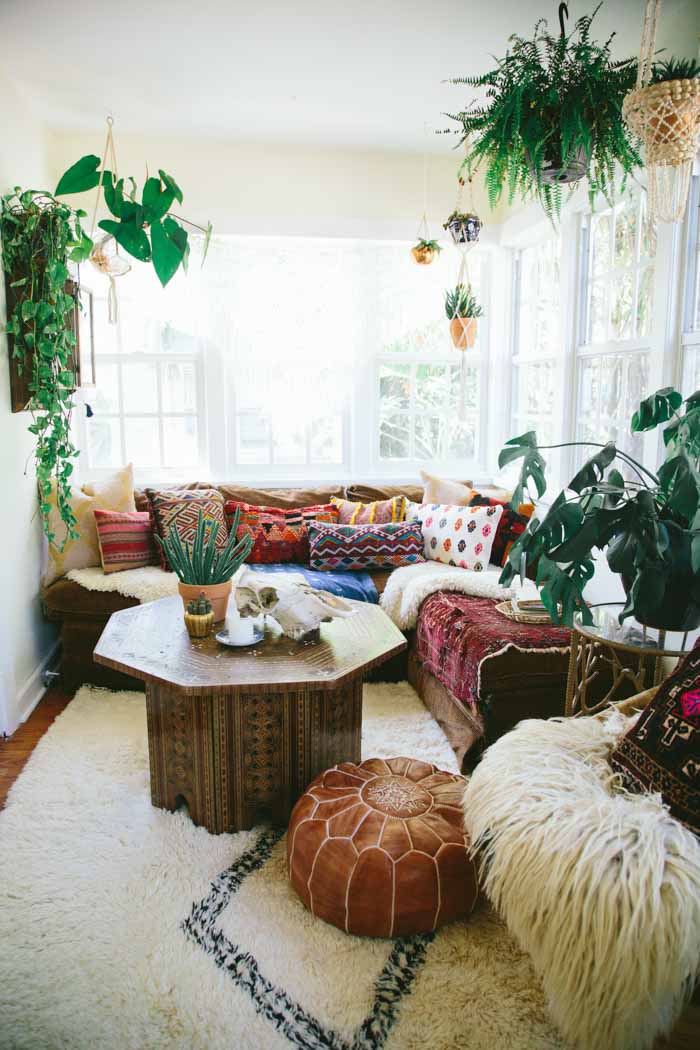 This charming bohemian space features lots of hanging greenery. So as you can see, you can do whatever you like and you won't make your interior less boho.