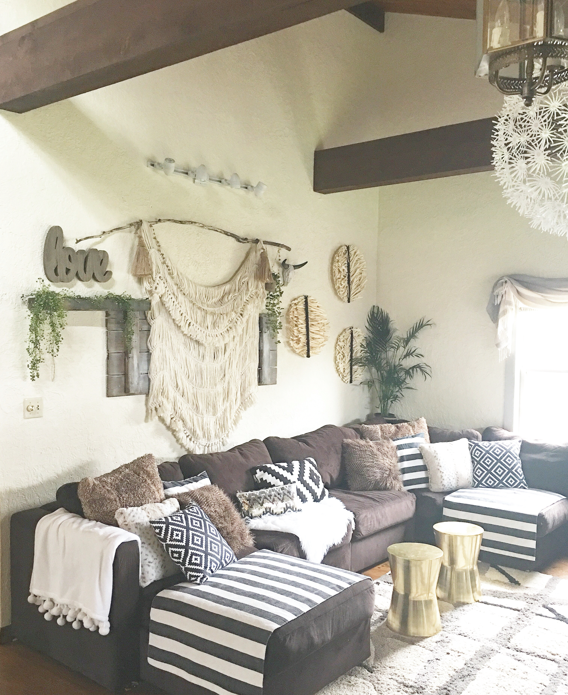Mixing boho, rustic and glam elements works great for living rooms.