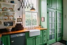 a bright green kitchen withwooden countertops and a colorful printed rug feels vintage