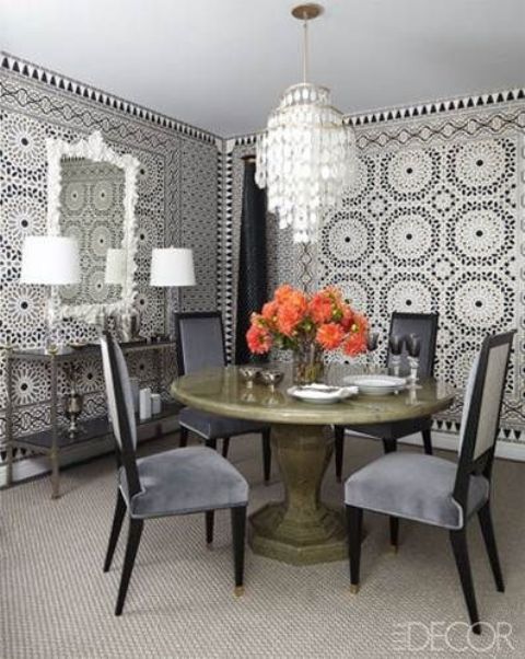give your dining space a Moroccan twist with such tile walls, a beautiful mother of pearl chandelier and a mirror in a refined frame