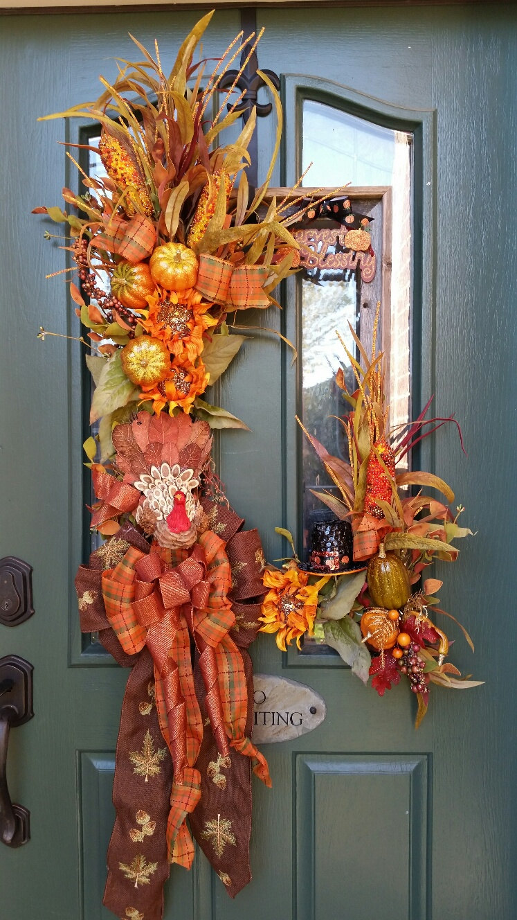 A beautiful Fall harvest arrangement could be hanged right on a door.
