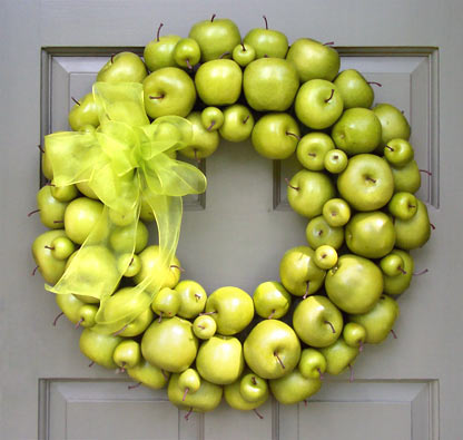 If you want a splash of freshness, hang a green apple wreath on your door. It'd contrast with traditional Fall colors really well.