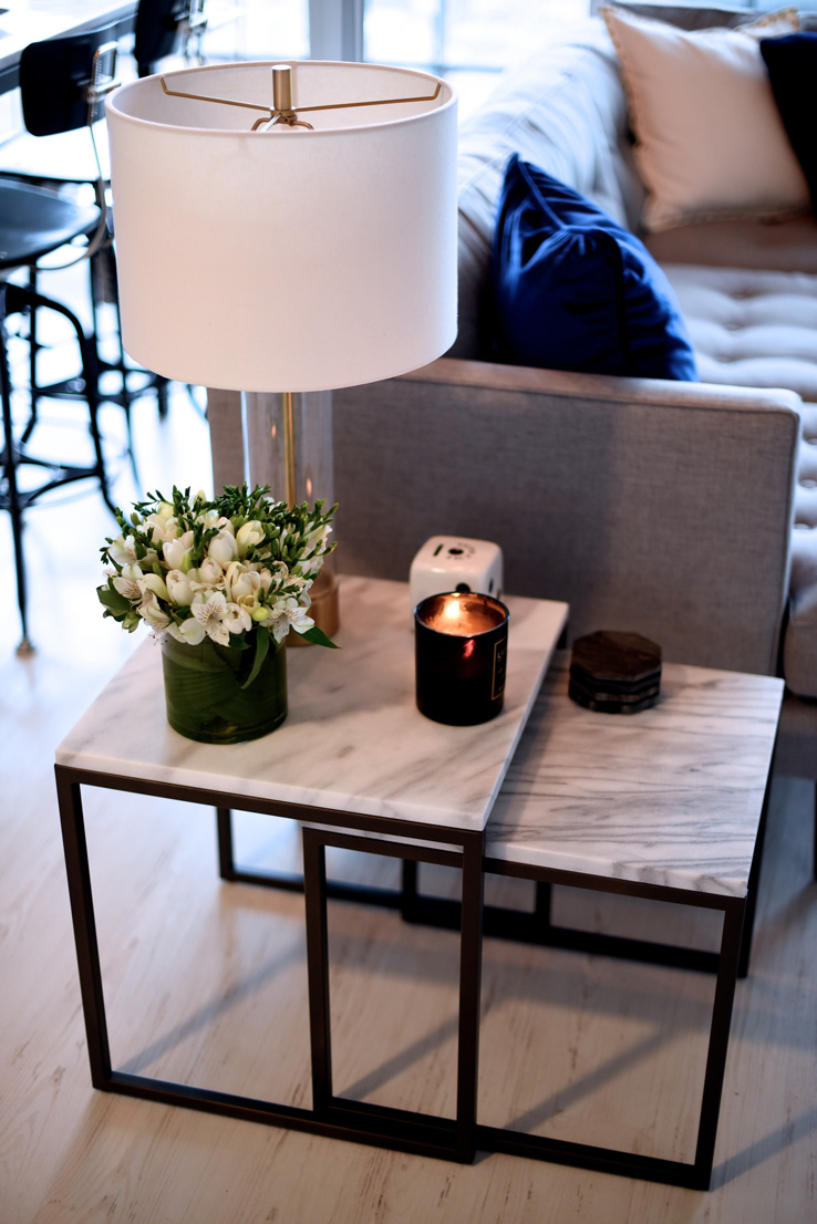 Nesting tables is a quite practical solution for small rooms. They usually come in sets of two or three, stack together, but can be pulled out to provide lots of tabletop surface when necessary.