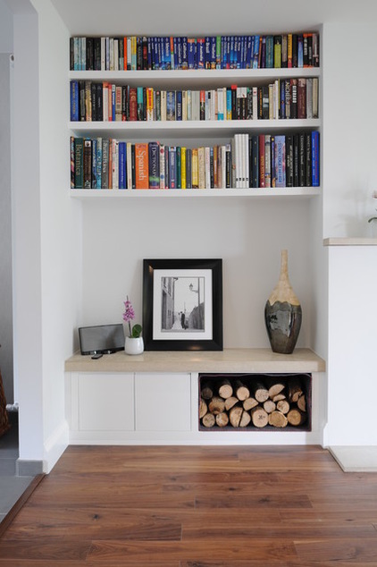 Niches are perfect for organized built-in storage solutions. Even simple shelves looks great there.
