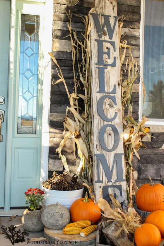 An oversized "Welcome" sign would definitely become a centerpiece of your Fall arrangement.