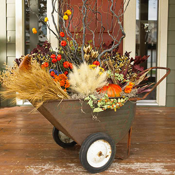 Repurpose a vintage wagon cart and fill it with products of Autumn for a mobile centerpiece.