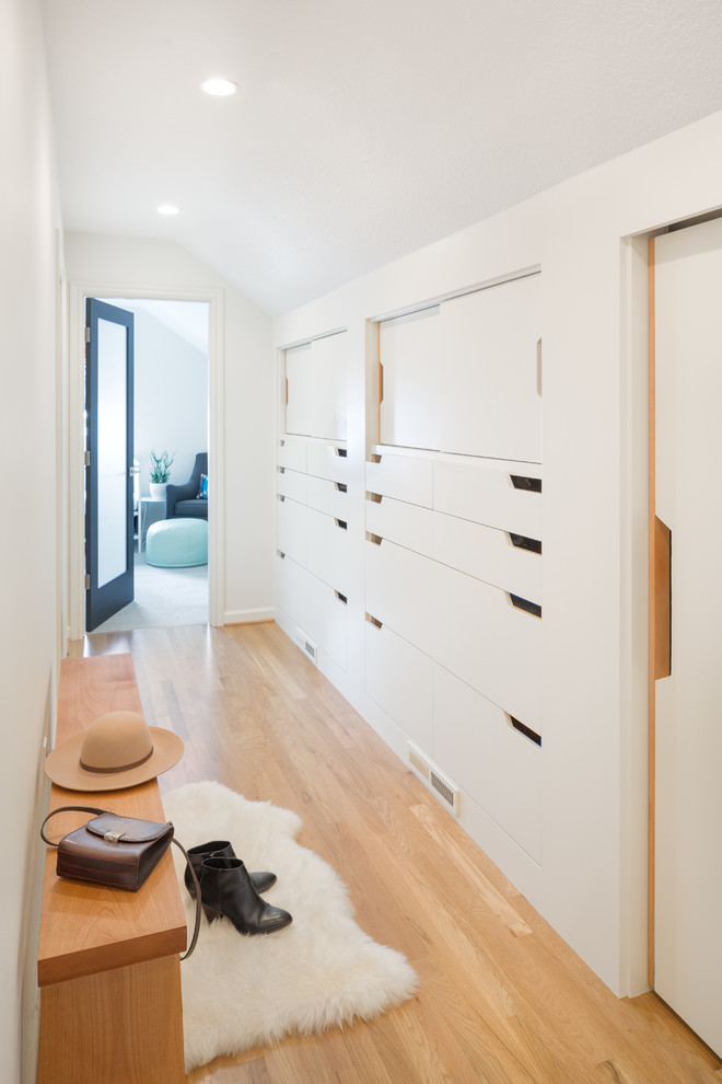 Built-in drawers is another way to turn your hallway into a storage mecca. Lots of folded clothes, shoes, jewelry and other small things could be stored there.