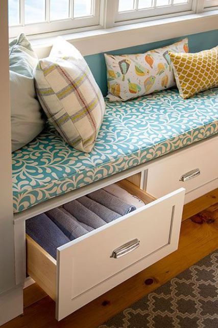 drawers built into a windowsill bench are nice for storing blankets, pillows and other stuff you may need