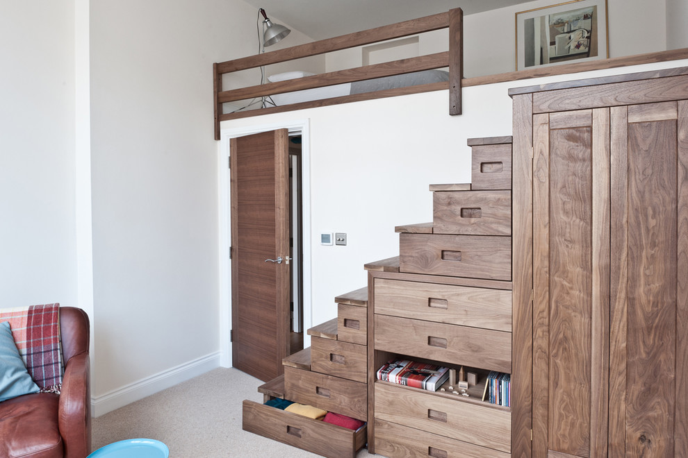 Ingenious small bedroom design where under bed storage is take to another level with drawer stairs and a matching wardrobe