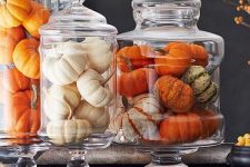 natural pumpkins in jars with lids are a nice and veyr easy fall decoration to go for