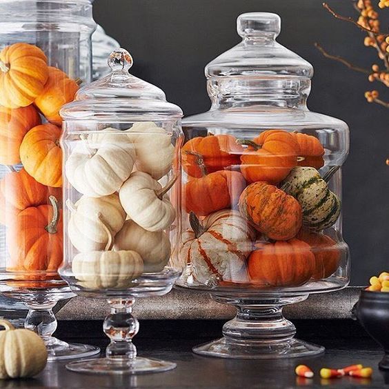 natural pumpkins in jars with lids are a nice and veyr easy fall decoration to go for