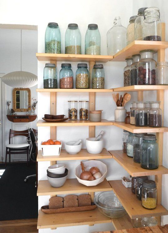 open shelves taking an awkward corner allow you using the whole space you have at hand